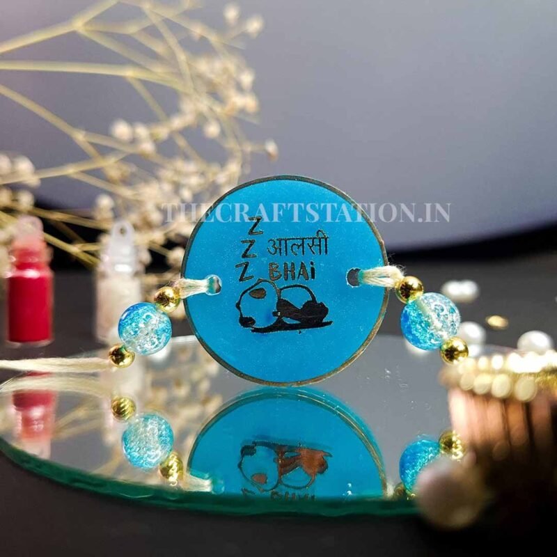 QUIRKY SLANG BLUE RESIN RAKHI