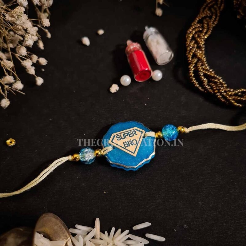 QUIRKY SLANG BLUE RESIN RAKHI - Image 3