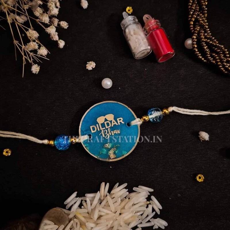 QUIRKY SLANG BLUE RESIN RAKHI - Image 4
