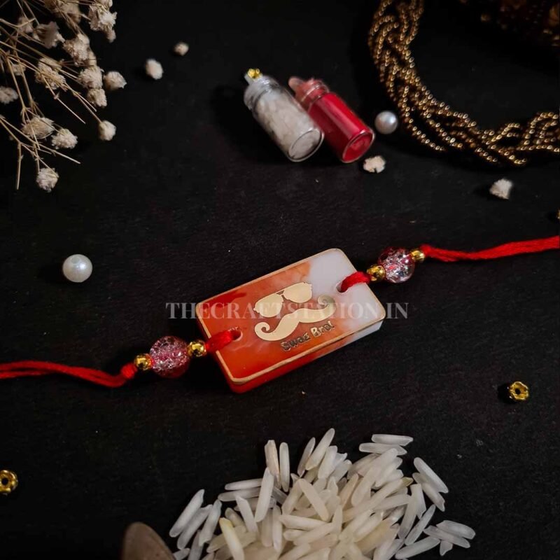 QUIRKY SLANG RED RESIN RAKHI - Image 6